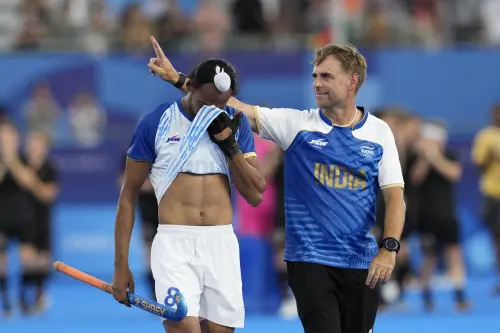 India's Hardik Singh, left, reacts after India lost the men's semifinal field hockey match to Germany at the Yves-du-Manoir Stadium during the 2024 Summer Olympics. | Photo: AP