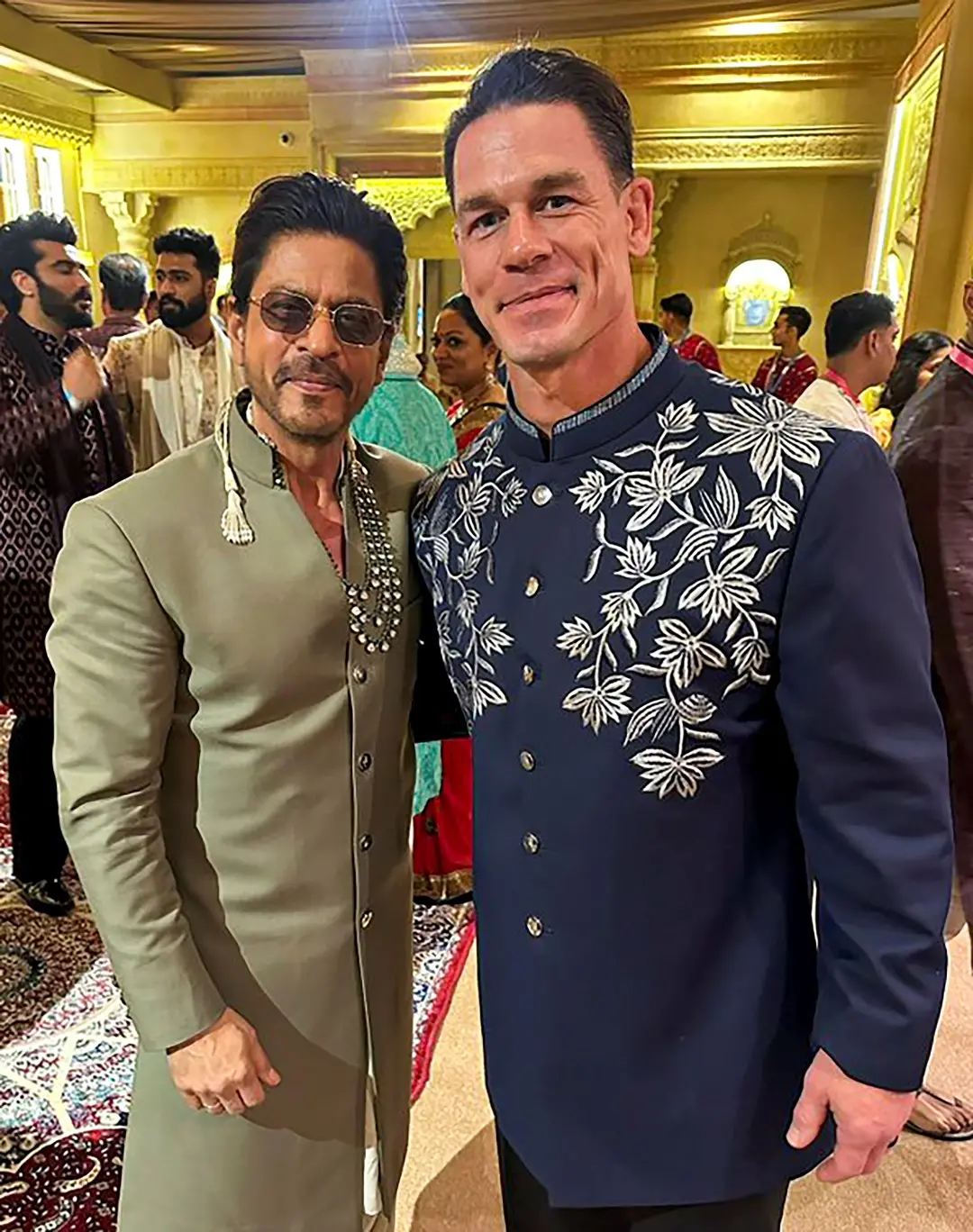 Shah Rukh Khan with John Cena during the wedding ceremony of Anant Ambani and Radhika Merchant | Photo: PTI