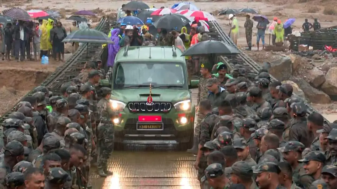 First vehicle to passes through the newly constructed Bailey Bridge