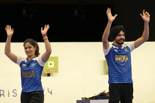 Manu Bhaker, left, and teammate Sarabjot Singh