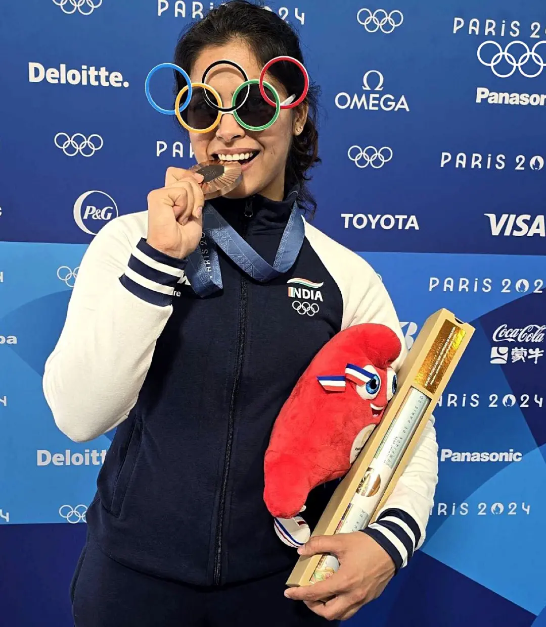 Shooter Manu Bhaker poses for a picture after winning in the Olympic Games Paris 2024
