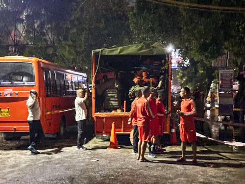 Rescue operation underway for missing students after a nearby drain burst caused flooding at the basement of a UPSC coaching centre, in Delhi's Old Rajendra Nagar. | Photo: PTI