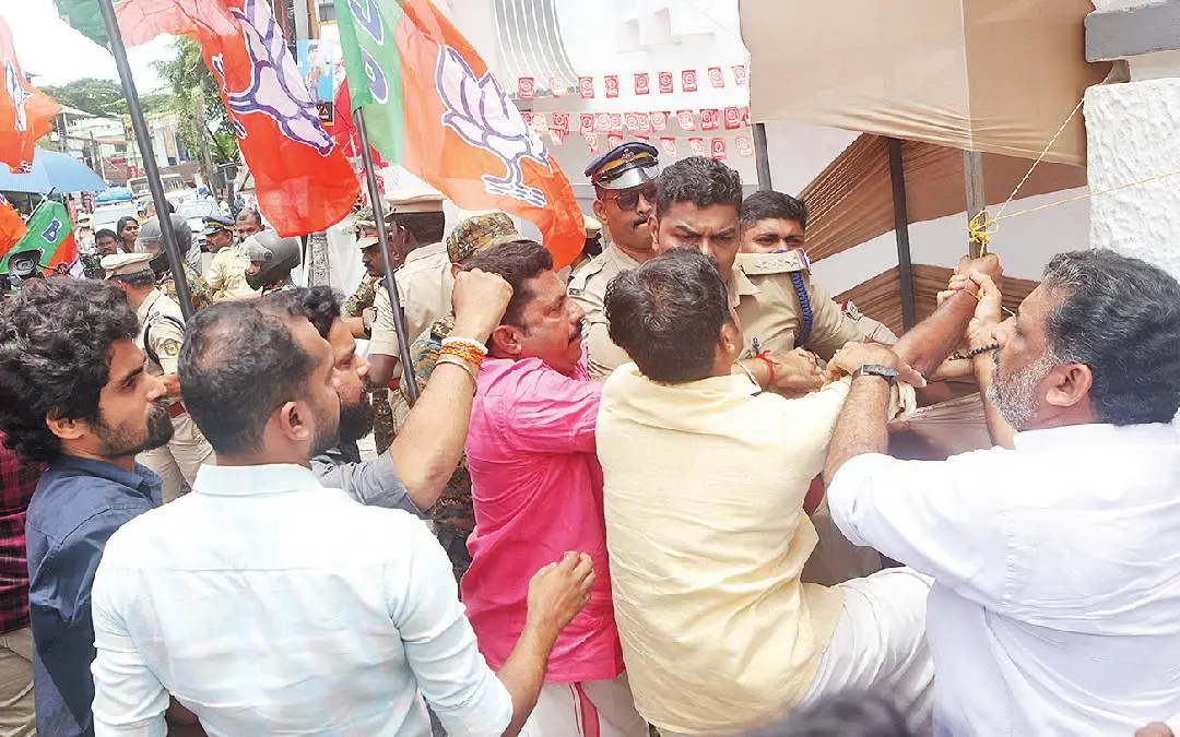 BJP activists hold protests after allegations over paying tribute to Pakistan's former president Pervez Musharraf at the Bank of India staff union conference in Alappuzha