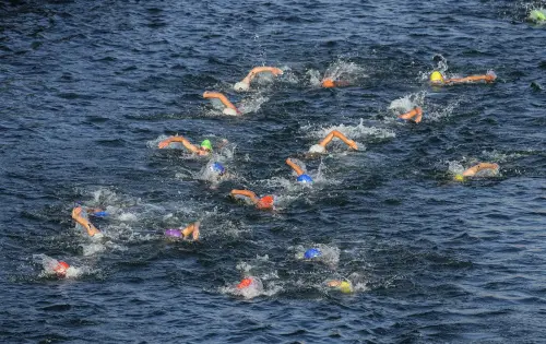 Athletes swim in the Seine river. l File Photo: AP