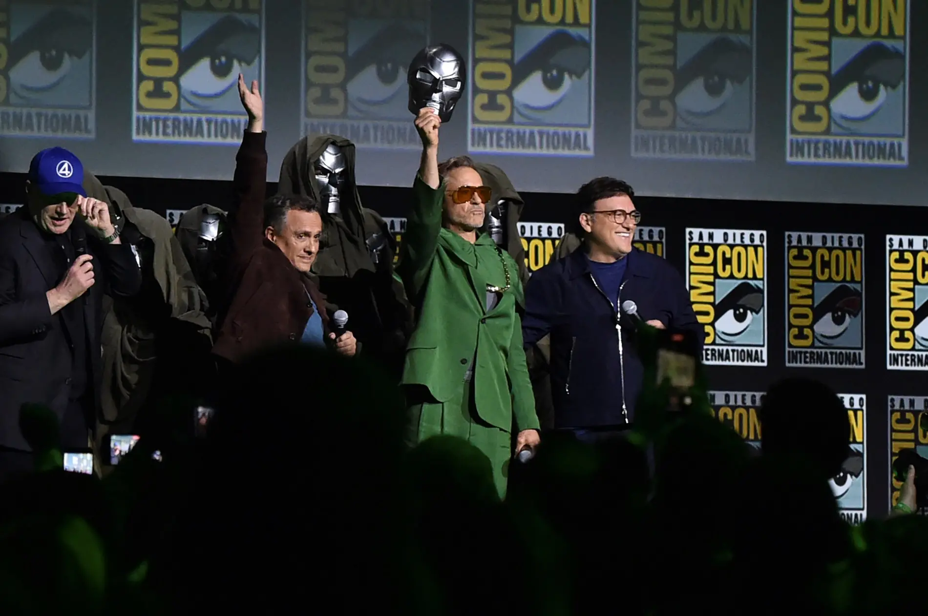 Kevin Feige, from left, Joe Russo, Robert Downey Jr., and Anthony Russo attend a panel for 'Marvel Studios' during Comic-Con | Photo: AP