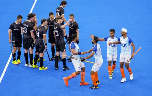 India's Harmanpreet Singh celebrates with teammates after scoring a goal from a penalty stroke against New Zealand during the Pool B hockey match between India and New Zealand, at the Summer Olympics 2024. | Photo: AP