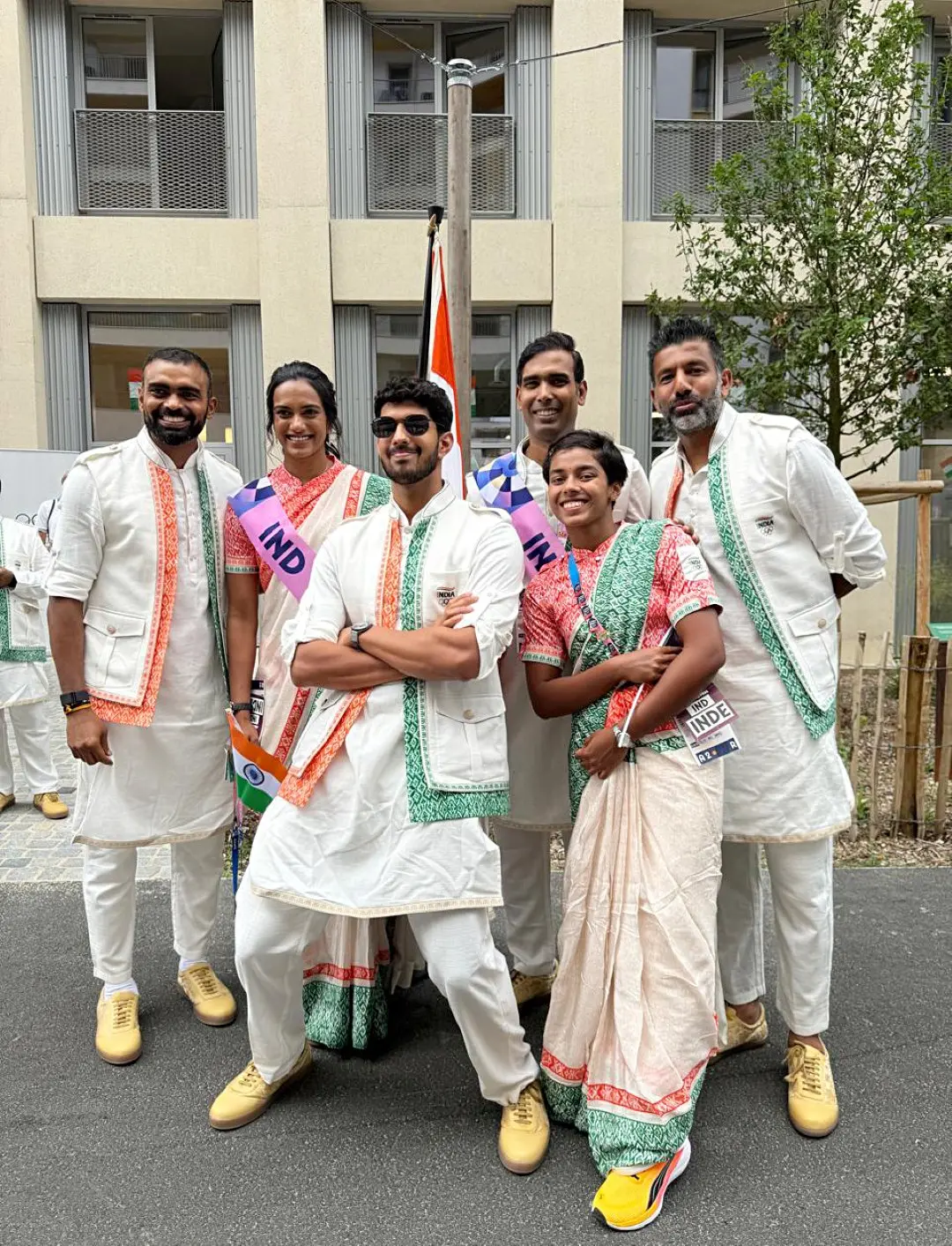 India's flag-bearers, PV Sindhu and Achanta Sharath Kamal pose for a group picture