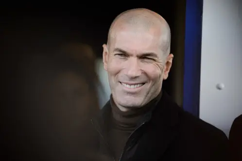 Zinedine Zidane shines as Olympic flame torchbearer in Paris