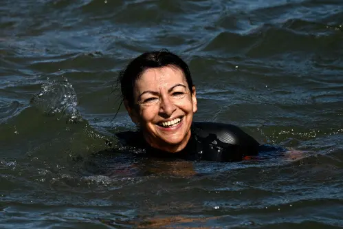 Mayor Hidalgo dips into Seine river, declares it fit for Paris Olympics swimming