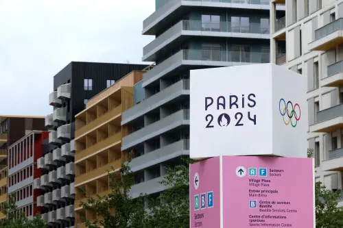 This photograph shows a Paris 2024 sign at site of the Olympic village where the athletes will be housed in Saint-Denis, a nearby suburb of Paris | Photo: AFP