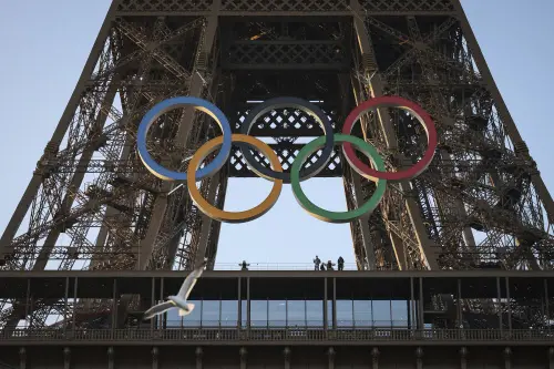 The 95-foot-long and 43-foot-high structure of five rings, made entirely of recycled French steel, will be displayed on the south side of the 135-year-old historic landmark in central Paris, overlooking the Seine River. l Photo: AP