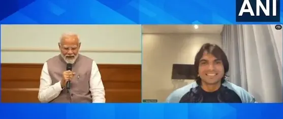 Prime Minister Narendra Modi interacts with Neeraj Chopra