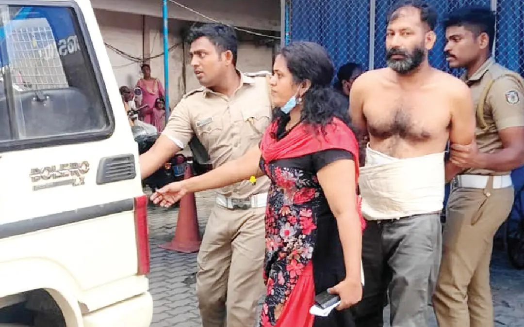 Policewoman Krishna along with other officers taking Sujith to the General Hospital for medical examination