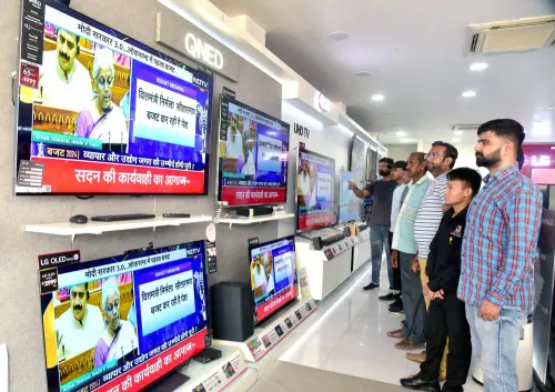 Employees watch the live telecast of Union Budget 2024-25