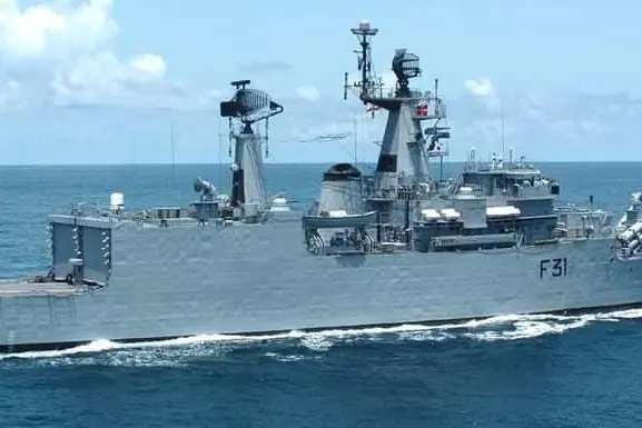 INS Brahmaputra severely damaged by fire; resting on one side; sailor missing