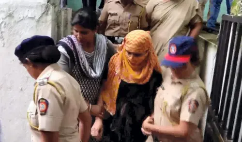 Controversial trainee IAS officer Pooja Khedkar's mother Manorama Khedkar being produced before a court, in Pune, on Saturday | Photo: PTI