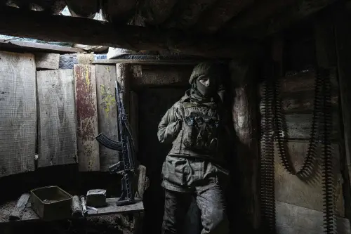 Ukrainian serviceman stands in a shelter I AP