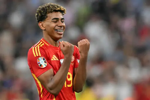 Lamine Yamal celebrates at the end of the UEFA Euro 2024 semi-final football match between Spain and France at the Munich Football Arena in Munich | Photo: AFP