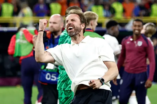 England's head coach Gareth Southgate celebrates after winning the UEFA Euro 2024 semi-final football match between the Netherlands and England at the BVB Stadion in Dortmund | Photo: AFP