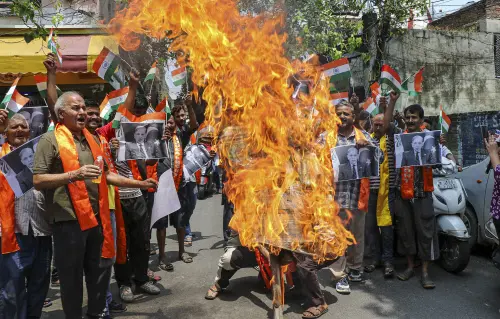 People stage a protest following a terrorist attack on an Army convoy in J&K's Kathua, in Jammu