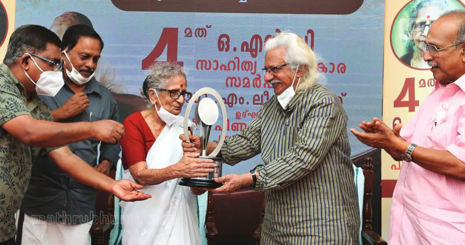 Dr M Leelavathy receives award from Adoor Gopalakrishnan