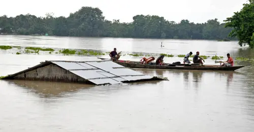 People travel in boats to move to a safer place