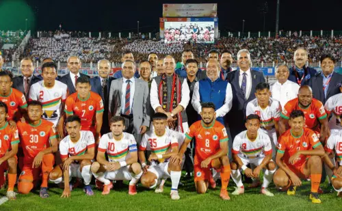 Union Defence Minister Rajnath Singh poses for photograph with Chief of the Army Staff General Manoj Pande, Manipur CM N Biren Singh and NEROCA FC (NFC) and TRAU FC (TFC) players at the opening ceremony of Durand Cup 2022, in Imphal | File Photo: ANI