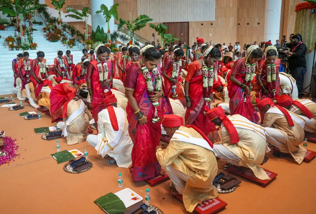 Couples get married during a mass wedding ceremony organised by Mukesh Ambani with his wife Nita Ambani, at the Reliance Corporate Park in Navi Mumbai