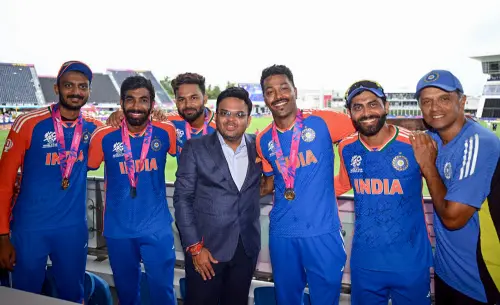 Victorious Indian cricket team members pose with BCCI secretary Jay Shah | ANI