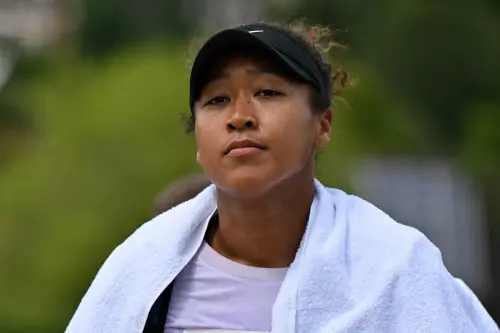 Naomi Osaka takes part in a training session ahead of the 2024 Wimbledon Championships at The All England Lawn Tennis and Croquet Club in Wimbledon, southwest London | Photo: AFP