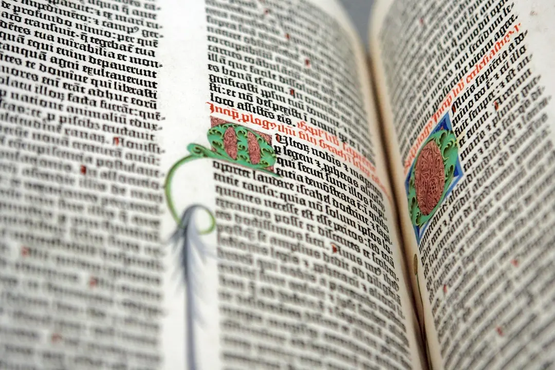 A detail of the Old Testament from the Gutenberg Bible on display at the personal library of Pierpont Morgan, the Morgan Library and Museum, in New York. Three times per year, a library curator turns the page. (File Photo: AP)