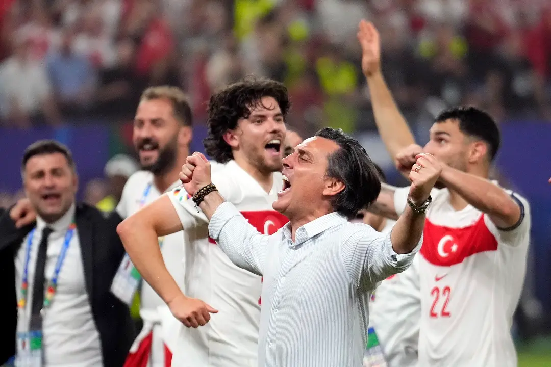Turkey's head coach Vincenzo Montella, center, celebrates following a Group F match between Czech Republic and Turkey at the Euro 2024 soccer tournament in Hamburg | Photo: AP