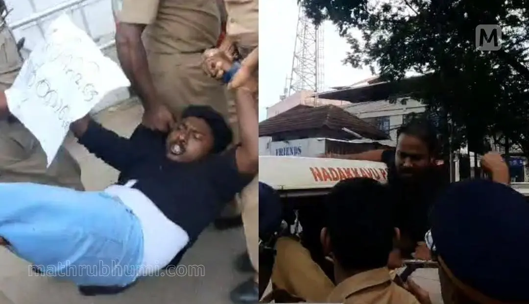 പ്രതിഷേധക്കാരെ പോലീസ് അറസ്റ്റ് ചെയ്തുനീക്കുന്നു