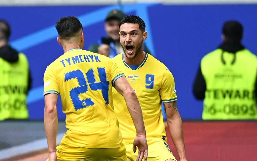 Ukraine stars celebrate a goal against Slovakia in the group match on Friday