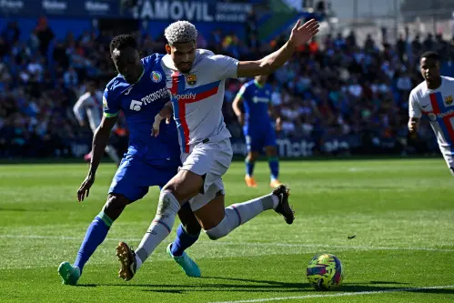 La Liga leader Barca held by Getafe, Atletico beat Almeria