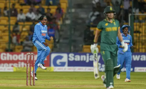 Indian bowler Asha Sobhana celebrates the wicket of South African batter Marizanne Kapp during the first women's ODI cricket match between India and South Africa at M. Chinnaswamy Stadium, in Bengaluru. l Photo: PTI