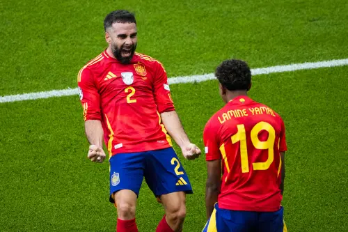 Spain's Dani Carvajal, left, celebrates with Spain's Lamine Yamal after scoring his side's third goal during a Group B match between Spain and Croatia at the Euro 2024 soccer tournament in Berlin, Germany. l Photo: AP