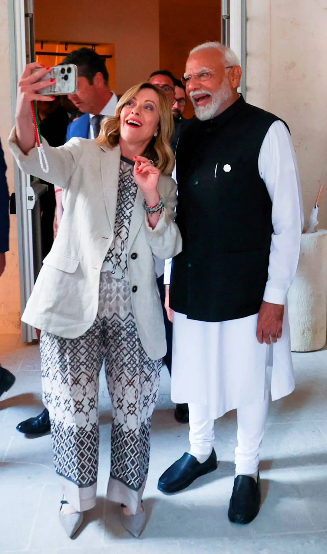 Prime Minister of Italy Giorgia Meloni takes a selfie with Prime Minister Narendra Modi on the sidelines of the G7 summit