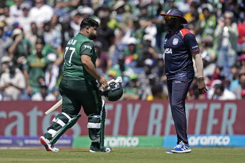 Azam Khan, left, reacts as he walks off the field after losing his wicket during the match against United States | AP