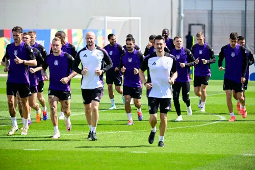 Germany's midfielder #21 Ilkay Gundogan (C) and teammates take part in a MD-1 training session in Herzogenaurach, Bavaria. l Photo: AFP