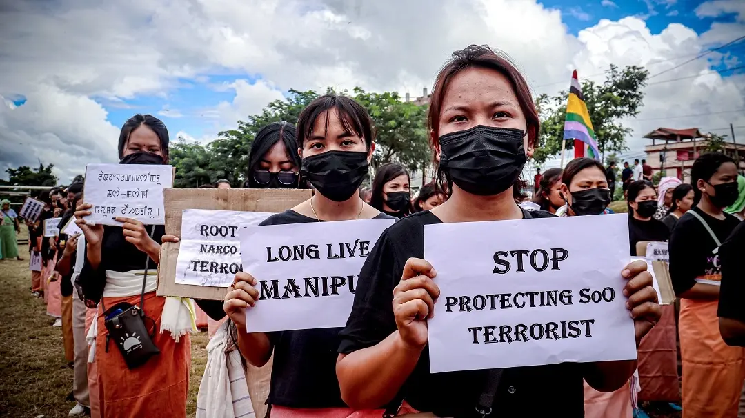 Khurai Pana Naha Sing (Youth of Khurai Pana) holding placards take part in a silent protest rally appealing for restoration of peace in strife-ridden Manipur | Filephoto: ANI