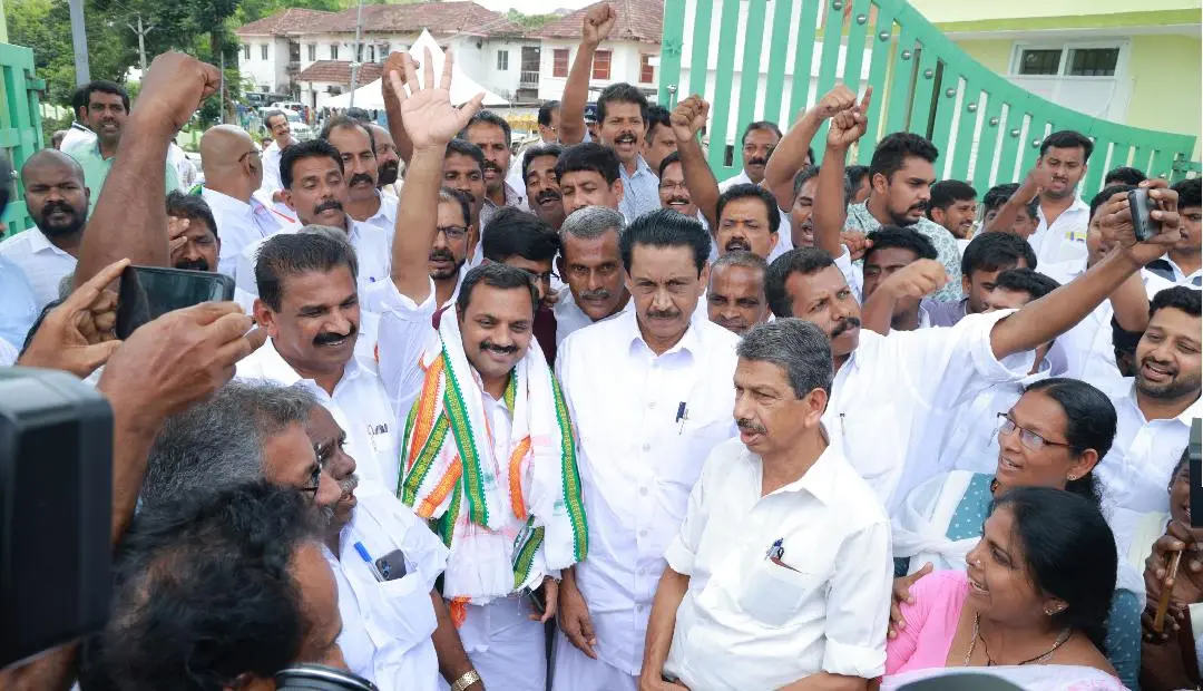 Dean Kuriakose celebrates victory with workers