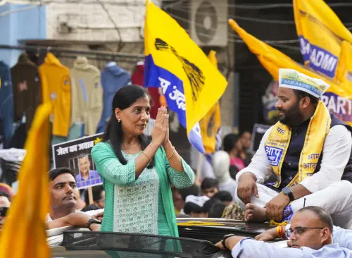 Jailed Delhi Chief Minister Arvind Kejriwal's wife Sunita Kejriwal during a roadshow for Lok Sabha elections in East Delhi constituency, in New Delhi, on Saturday. l Photo: PTI