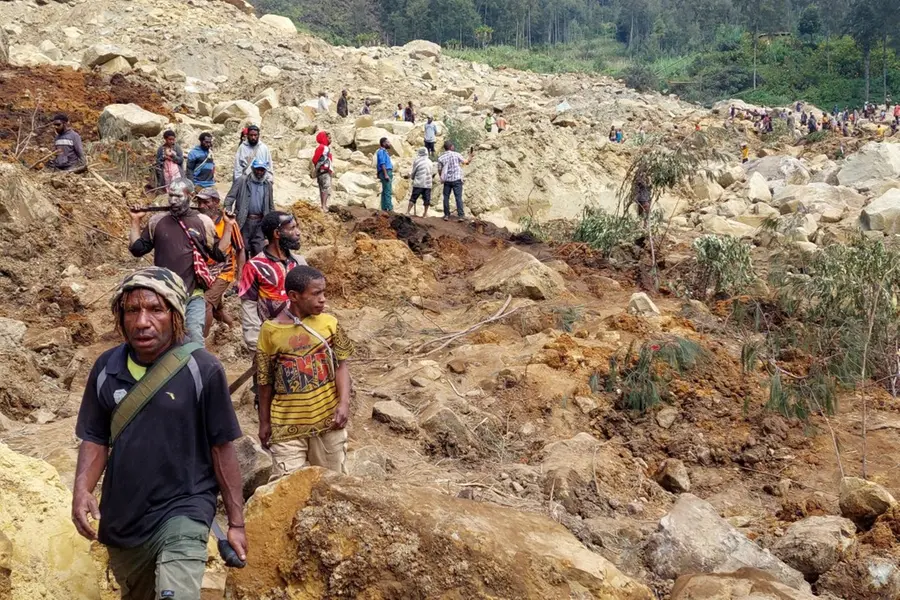 Papua New Guinea government says Friday's landslide buried 2,000 people and formally asks for help