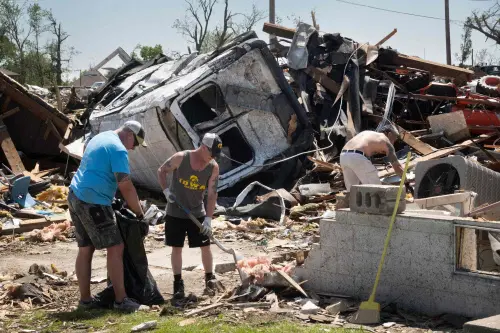 Residents continue recovery and cleanup efforts with the help of family and friends | Photo- Getty Images via AFP