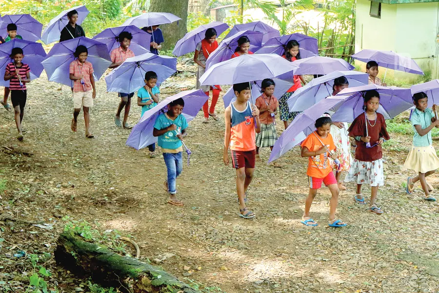 Look at the umbrellas we made, say these tribal children in Thrissur showing off their work