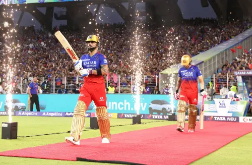 Royal Challengers Bengaluru's openers Virat Kohli and Faf du Plessis enter the field for IPL Eliminator match against Rajasthan Royals, at Narendra Modi Stadium in Ahmedabad on Wednesday. (ANI Photo)