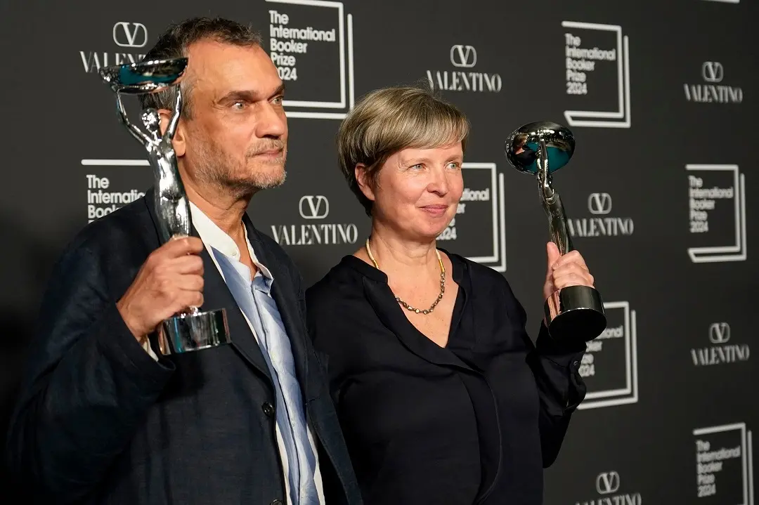 Jenny Erpenbeck, author of 'Kairos', right, and translator Michael Hofmann pose with the trophy after winning the International Booker Prize | Photo: AP