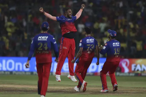 Royal Challengers Bengaluru's Yash Dayal, second left, celebrates with teammates after their win in the Indian Premier League cricket match against Chennai Super Kings in Bengaluru on Saturday. l Photo: AP