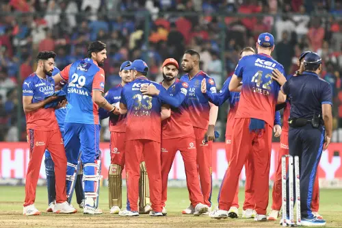 Players exchange handshakes after the match between Delhi Capitals and Royal Challengers Bengaluru in the Indian Premier League 2024, at M. Chinnaswamy Stadium in Bengaluru on Sunday. (ANI Photo)